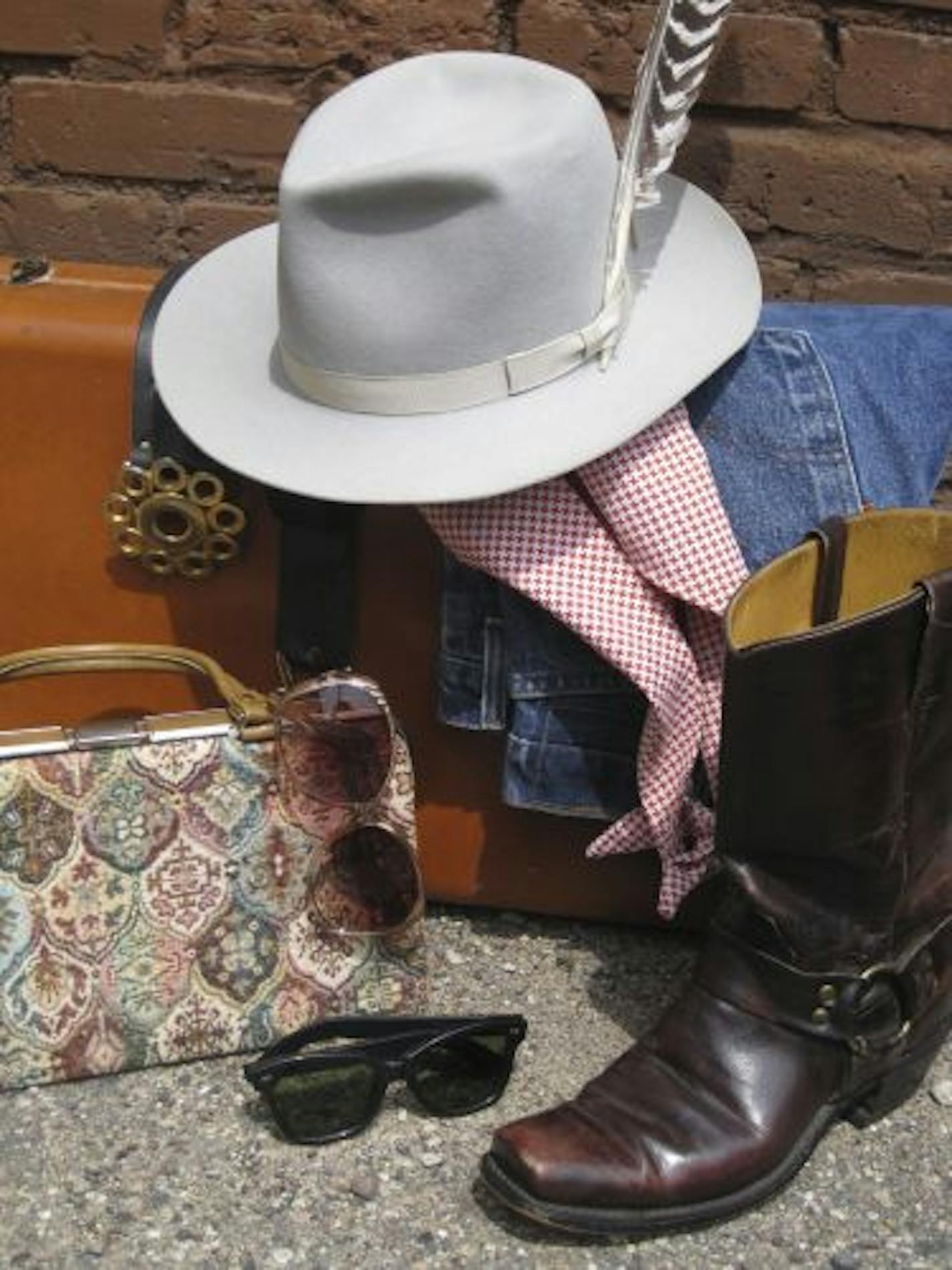 Vintage items on sale during Tatters anniversary include a Mallory fedora $16 (sale price), gingham halter top $7, Levi�s 505 jeans $14, harness boots $16, Wayfarer sunglasses $3, purse $9, belt $7, and Samsonite suitcase $10.50.