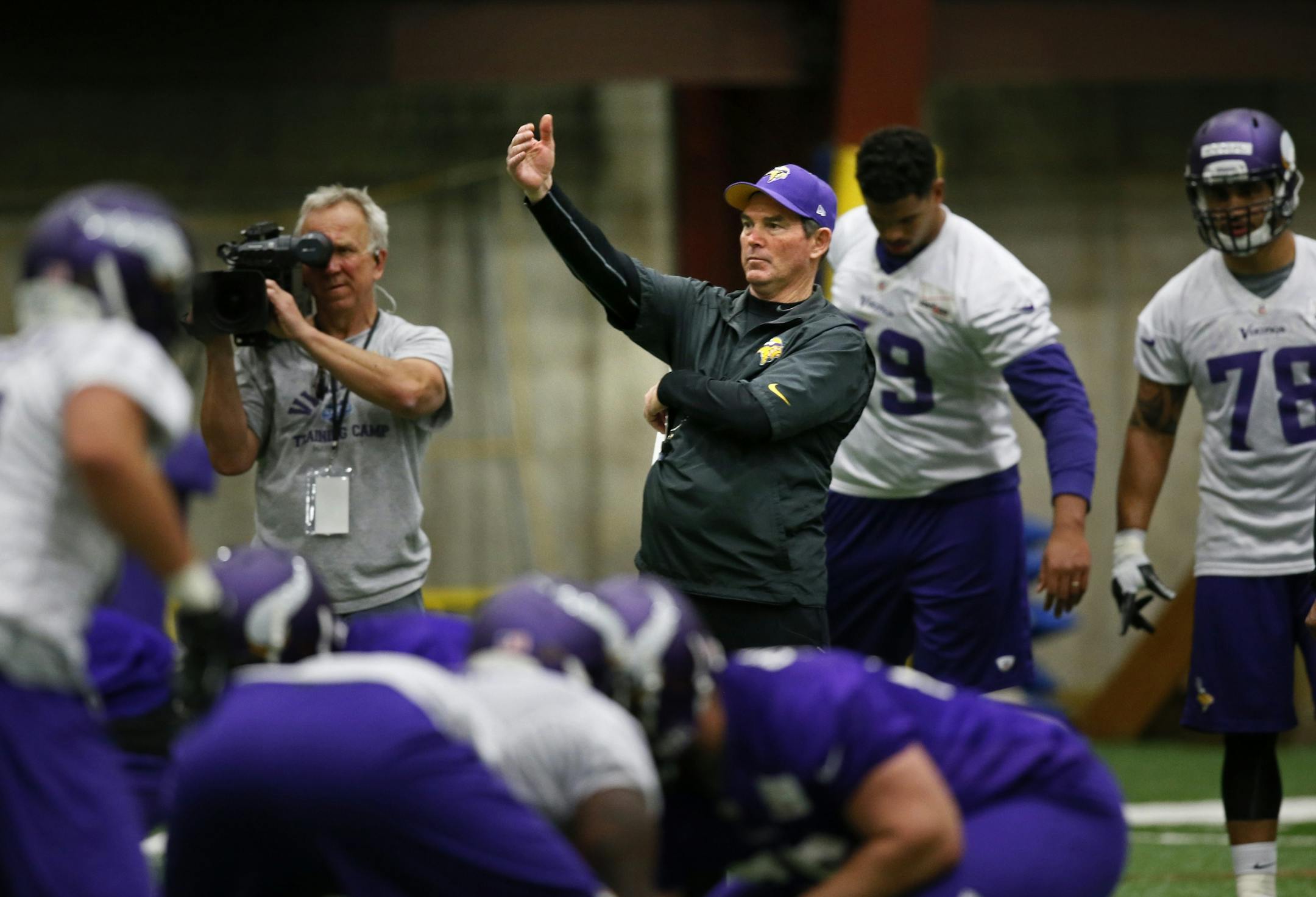 Vikings coach Mike Zimmer, getting to know his players at mini camp on Wednesday.