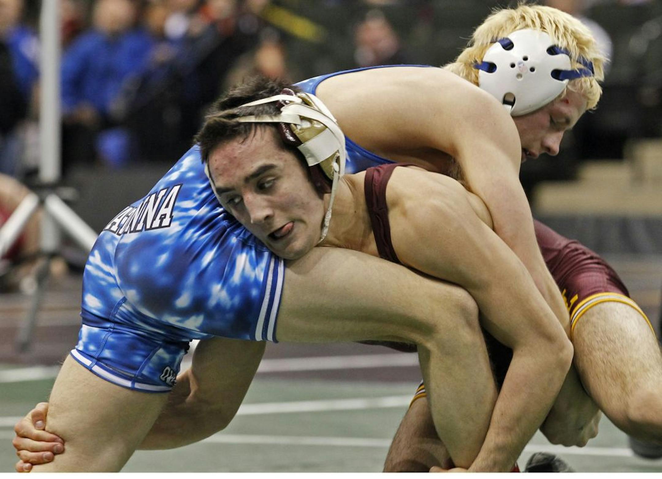 Ben Morgan of Forest Lake (maroon uniform), shown here wrestling Bowen Schultz of Owatonna, is back for his fifth and final year of varsity wrestling. Star Tribune photo by Marlin Levison