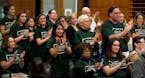 Supporters wearing green shirts applauded after the amending of Tobacco sales in Edina from a minimum age of 18 to 21. ] CARLOS GONZALEZ � cgonzalez