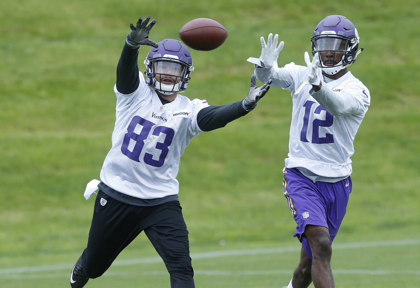 Rookie wide Receiver R.J. Shelton, left, tries to block the pass to rookie wide receiver Stacy Coley during the Minnesota Vikings NFL football team practice Wednesday, May 24, 2017, in Eden Prairie, Minn. (AP Photo/Jim Mone) ORG XMIT: MNJM10