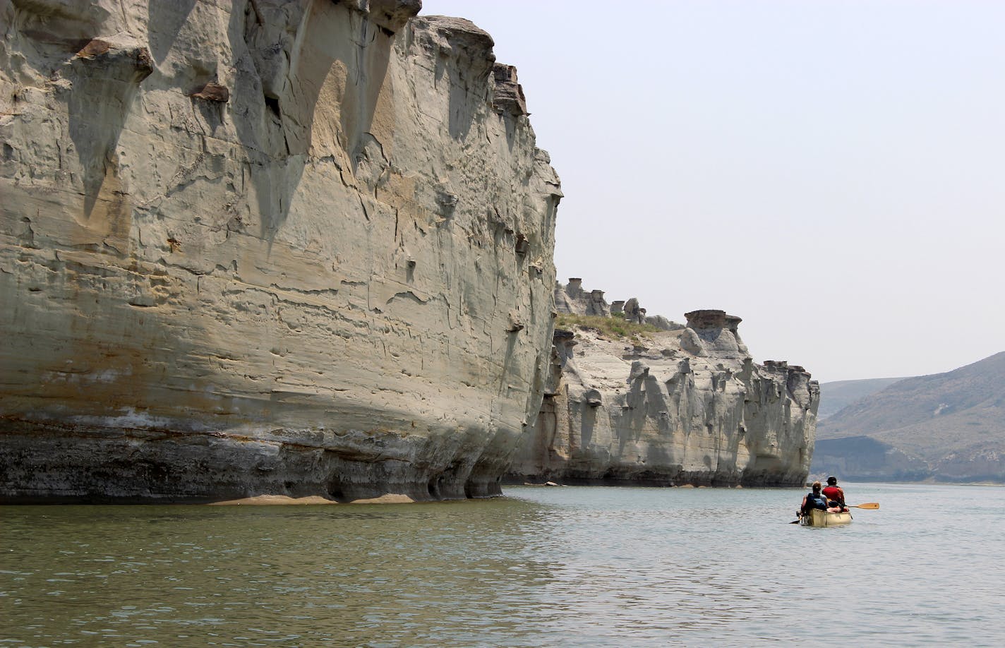 Steep cliffs meet the river in the White Cliffs area of the Breaks.