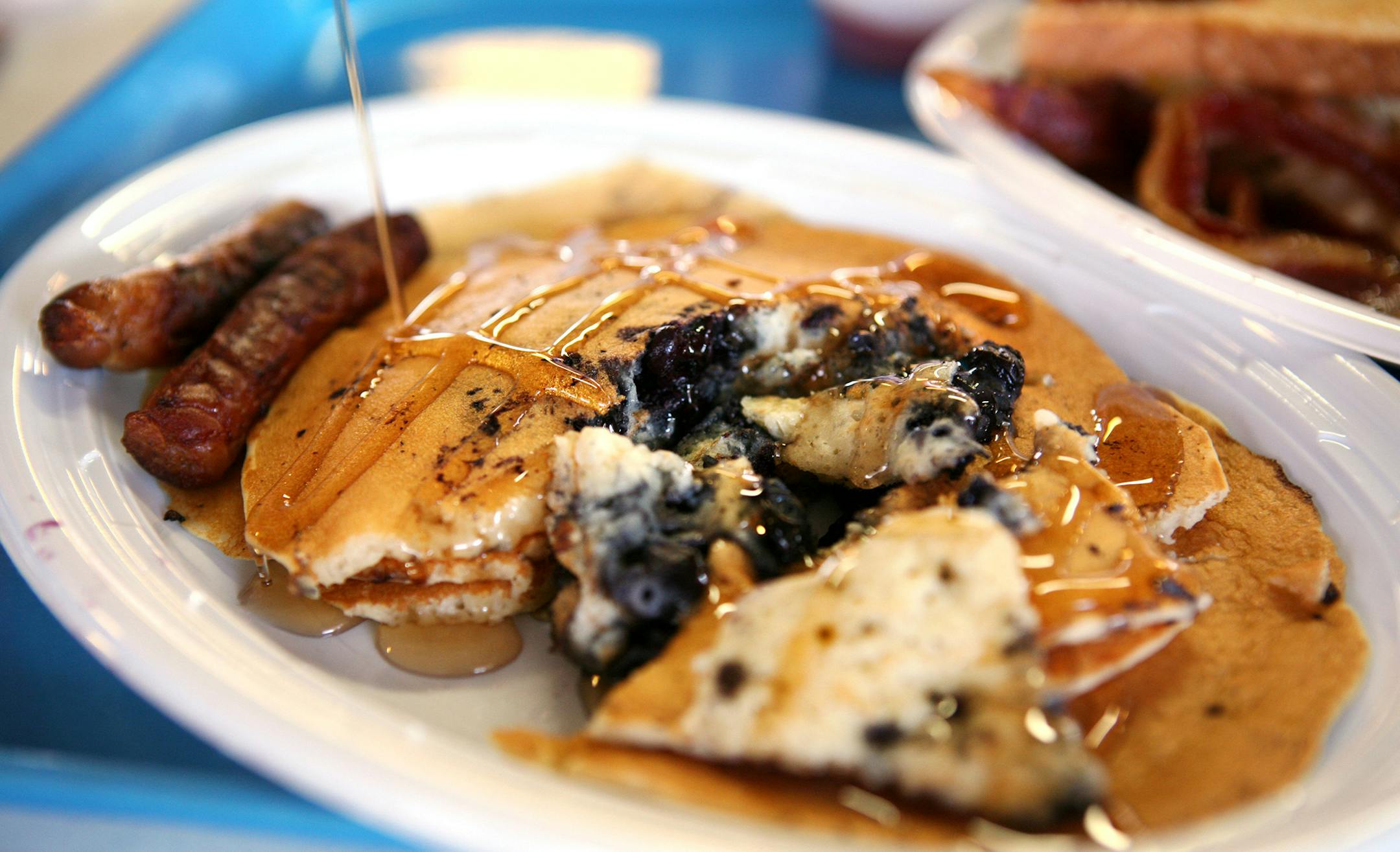 Blueberry pancakes with sausage at the OES Dining Hall at the Minnesota State Fair August 25, 2013. (Courtney Perry/Special to the Star Tribune)
