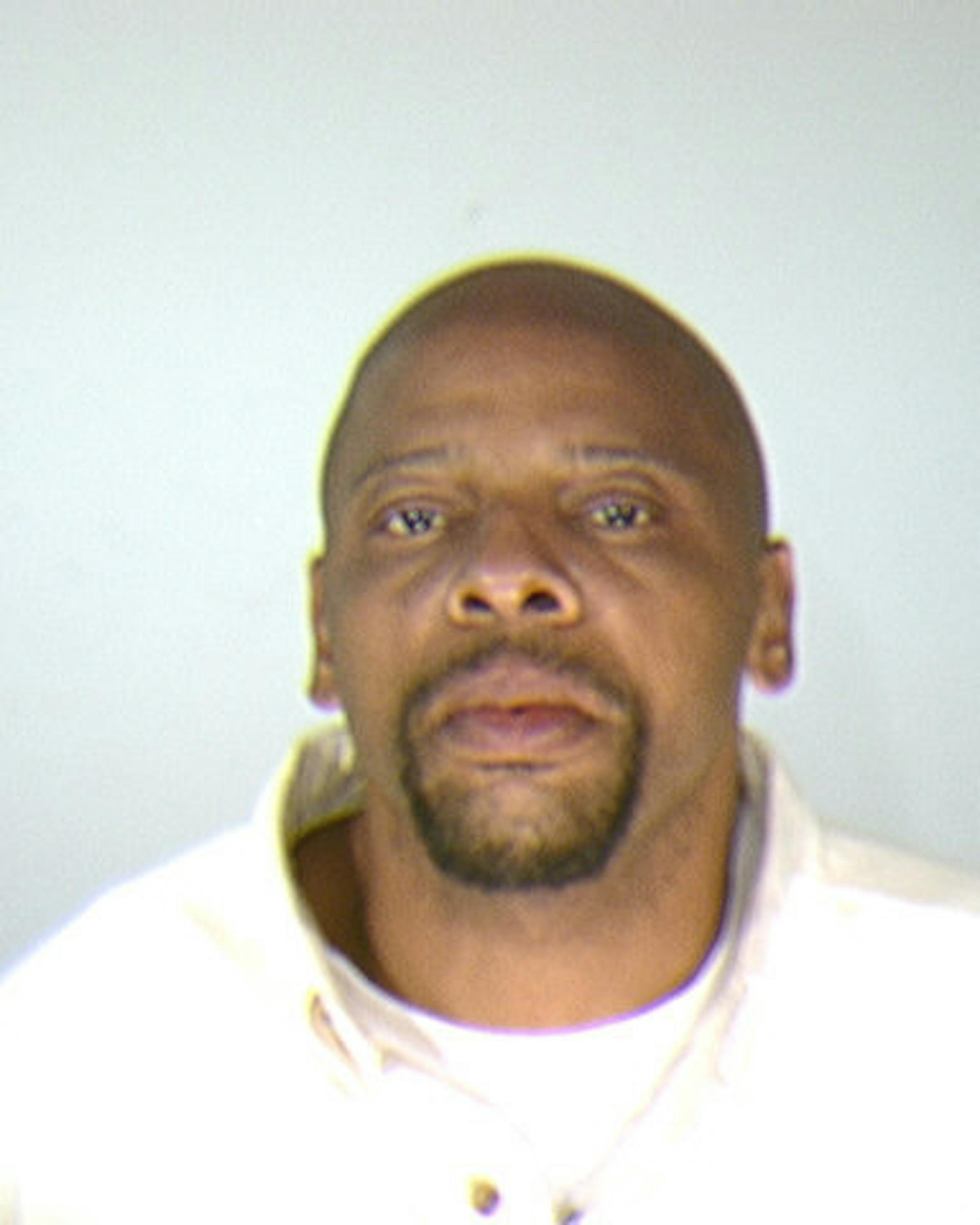 Marvin Spencer Sr. is charged with robbing a Pawn America in Roseville and shooting at three employees, wounding one in the leg.