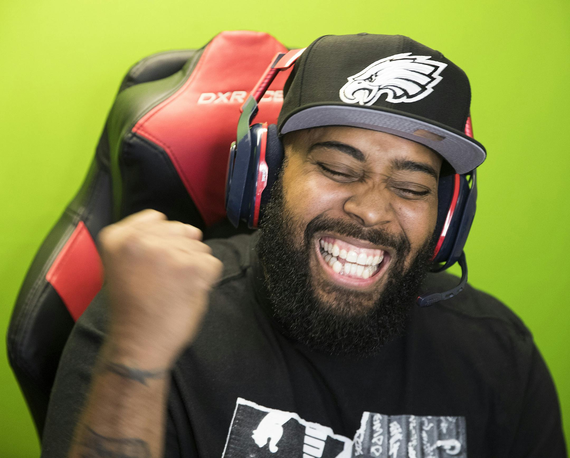 E-sports gamer David Carter of Drexel Hill has about 850,000 followers on YouTube, Facebook, Twitter and Instagram. He does his filming of esports videos, editing and chatting out of the basement of his Drexel Hill row home. He reacts while gaming in his basement on April 25, 2019. (Charles Fox/Philadelphia Inquirer/TNS) ORG XMIT: 1313718 ORG XMIT: MIN1905090332385157
