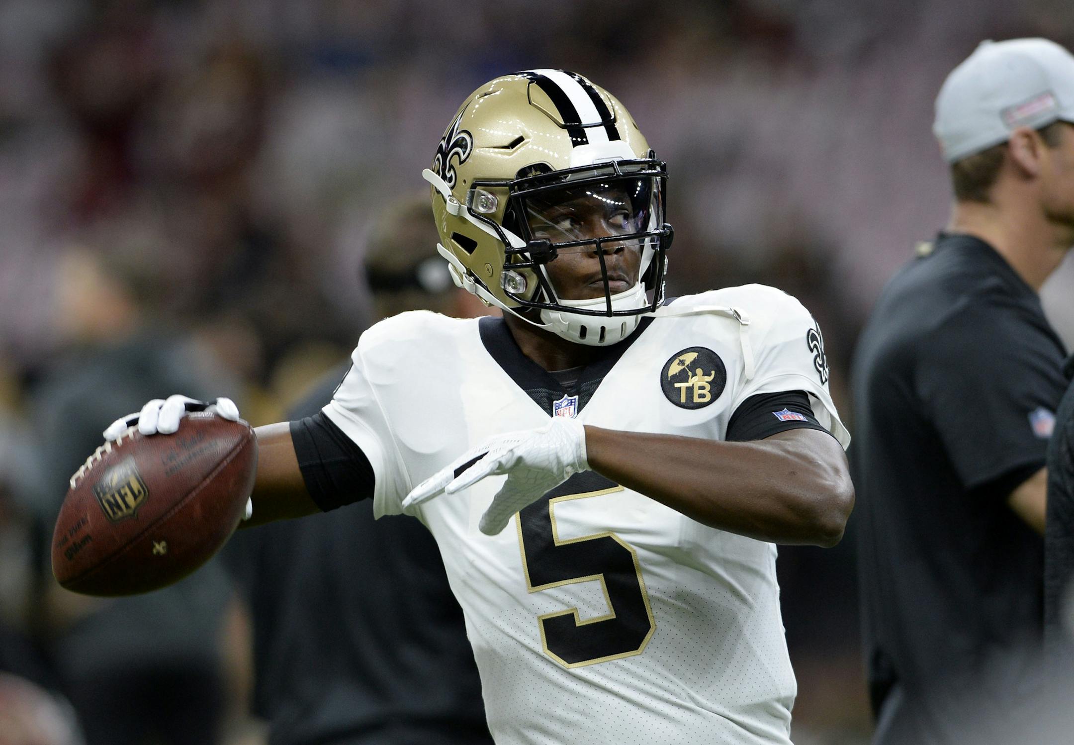 New Orleans Saints quarterback Teddy Bridgewater (5) warms up before an NFL football game against the Washington Redskins in New Orleans, Monday, Oct. 8, 2018. (AP Photo/Bill Feig)