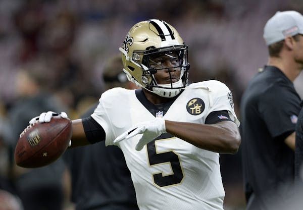 New Orleans Saints quarterback Teddy Bridgewater (5) warms up before an NFL football game against the Washington Redskins in New Orleans, Monday, Oct.