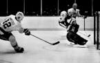 January 7, 1984 Dave Preuss of the Gophers scored a goal Friday night in a WCHA game against the University of Minnesota-Duluth. January 6, 1984 Tom S