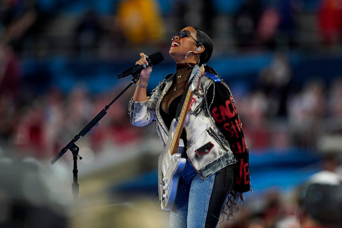 H.E.R. performs “America the Beautiful” before the Super Bowl in 2021