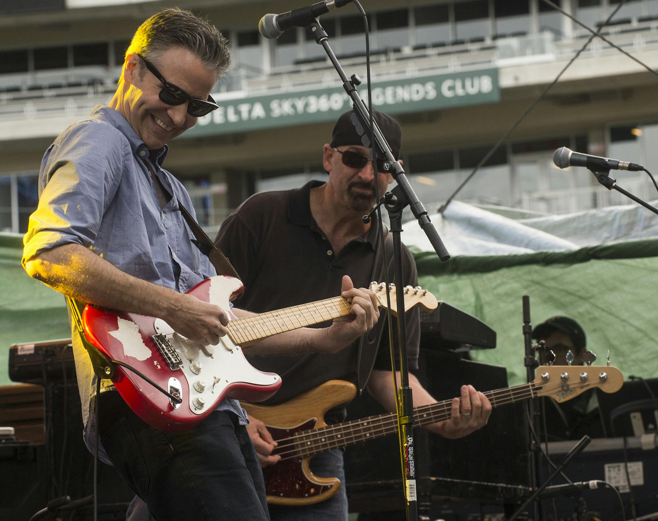 Erik Hess; Freelance Photographer Martin Zellar, left, and Nick Ciola during a Gear Daddies Skyline Music Festival gig at Target Field.
