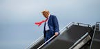 Former President Donald Trump arrives at Reagan National Airport en route to his arraignment in federal court on Thursday, August 3, 2023. Doug Mills/
