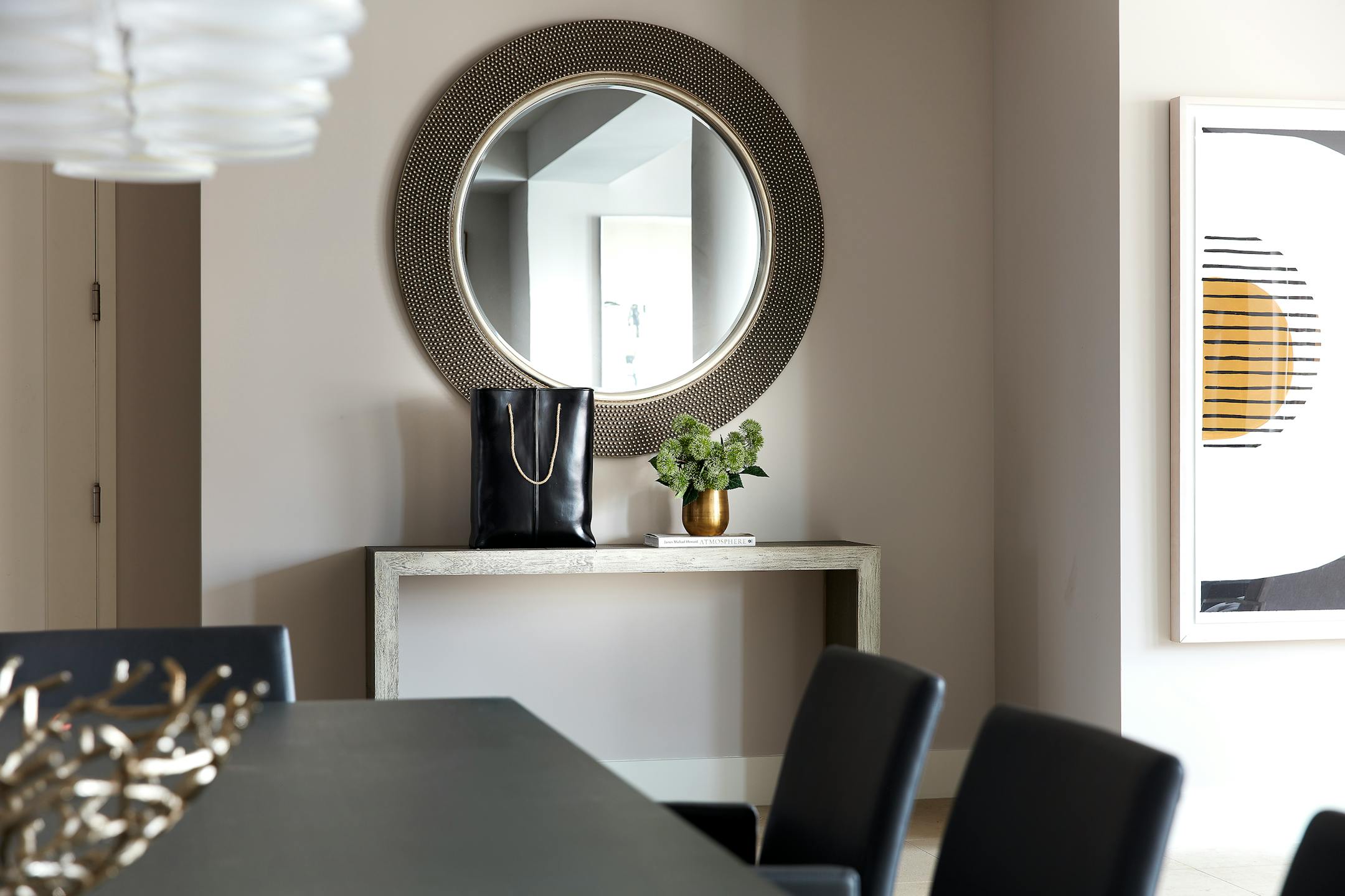 A console and mirror signal the point of entry in a foyer. (Scott Gabriel Morris/Provided photo/TNS)