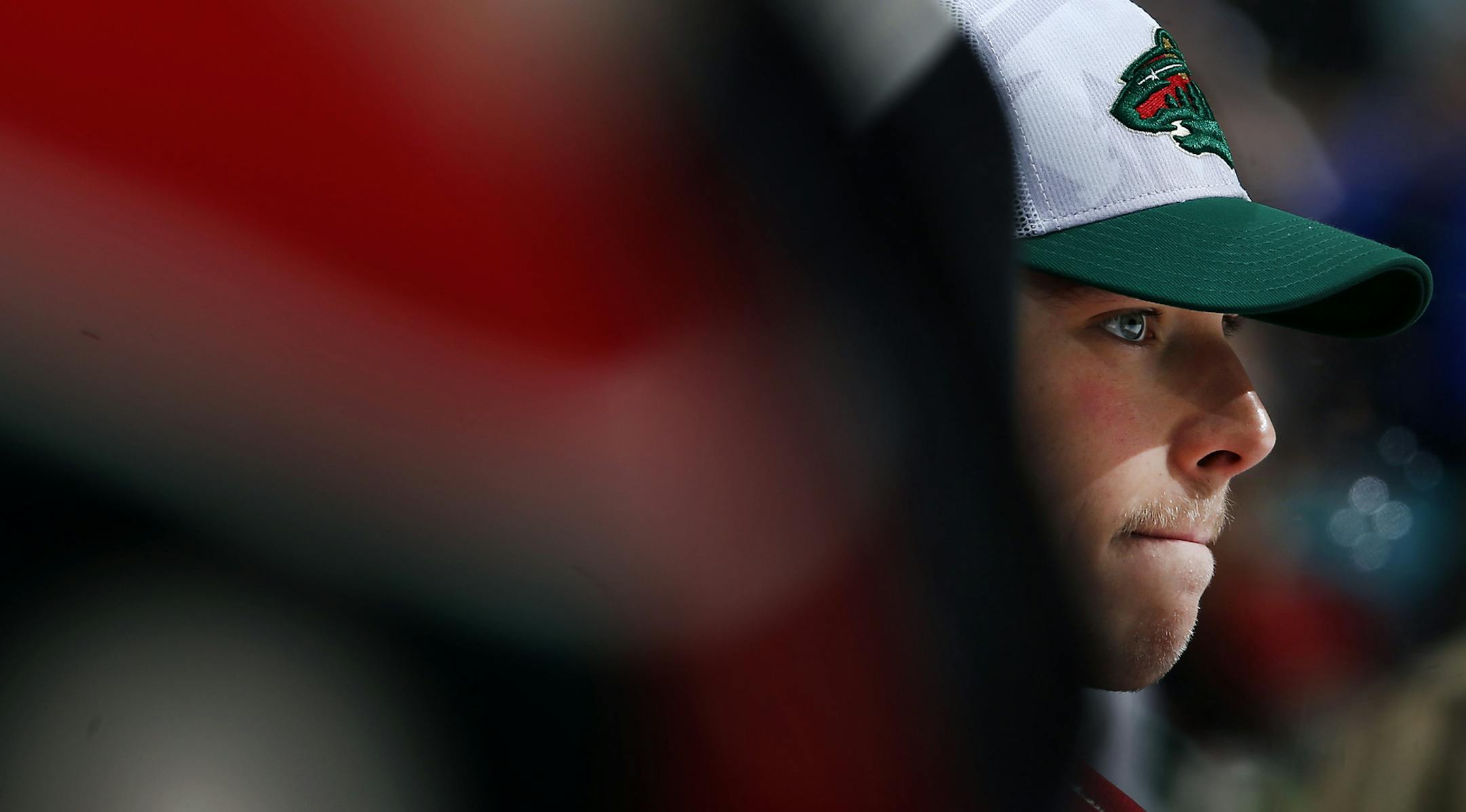 Minnesota Wild goalie Darcy Kuemper (35) watched from the bench in the second period. Kuemper gave up four goals in the first period and was replaced by Niklas Backstrom in the second period. ] CARLOS GONZALEZ cgonzalez@startribune.com - November 26, 2014, St. Paul, Minn., Xcel Energy Center, NHL, Minnesota Wild vs. (LA) Los Angeles Kings