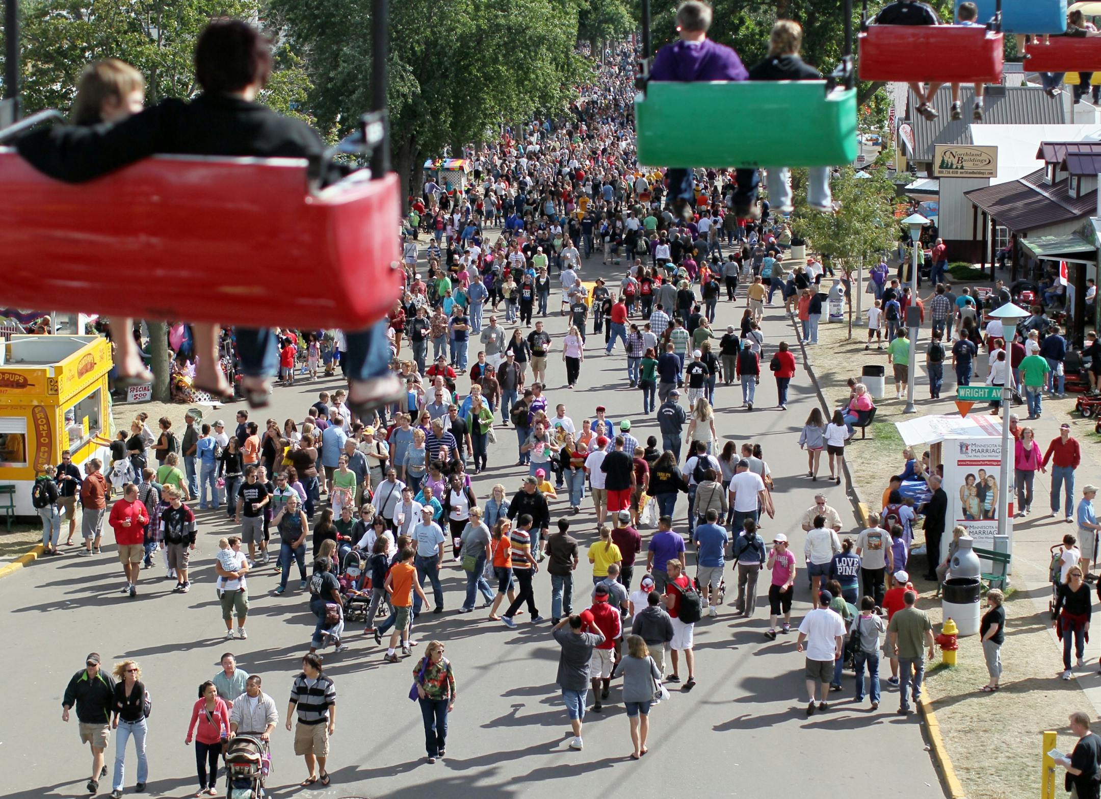 Fairgoers rode the Sky Glider over the crowds at the Minnesota State Fair on Sunday.