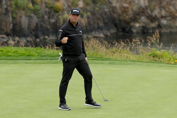 Gary Woodland reacts after making a birdie on the fifth hole during the second round of the U.S. Open golf tournament Friday, June 14, 2019, in Pebble