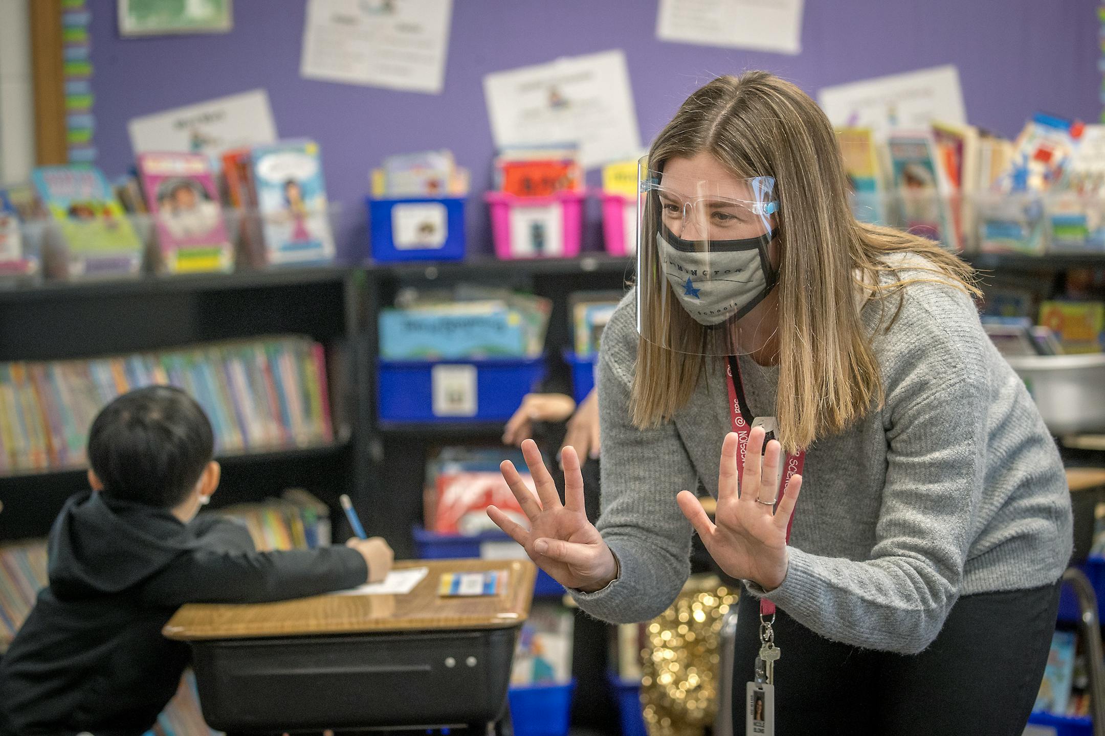 Poplar Elementary School second grade teacher Nicole Blons worked with her class during the first day of full in person instruction, Tuesday, January 19, 2021 in Bloomington, MN.