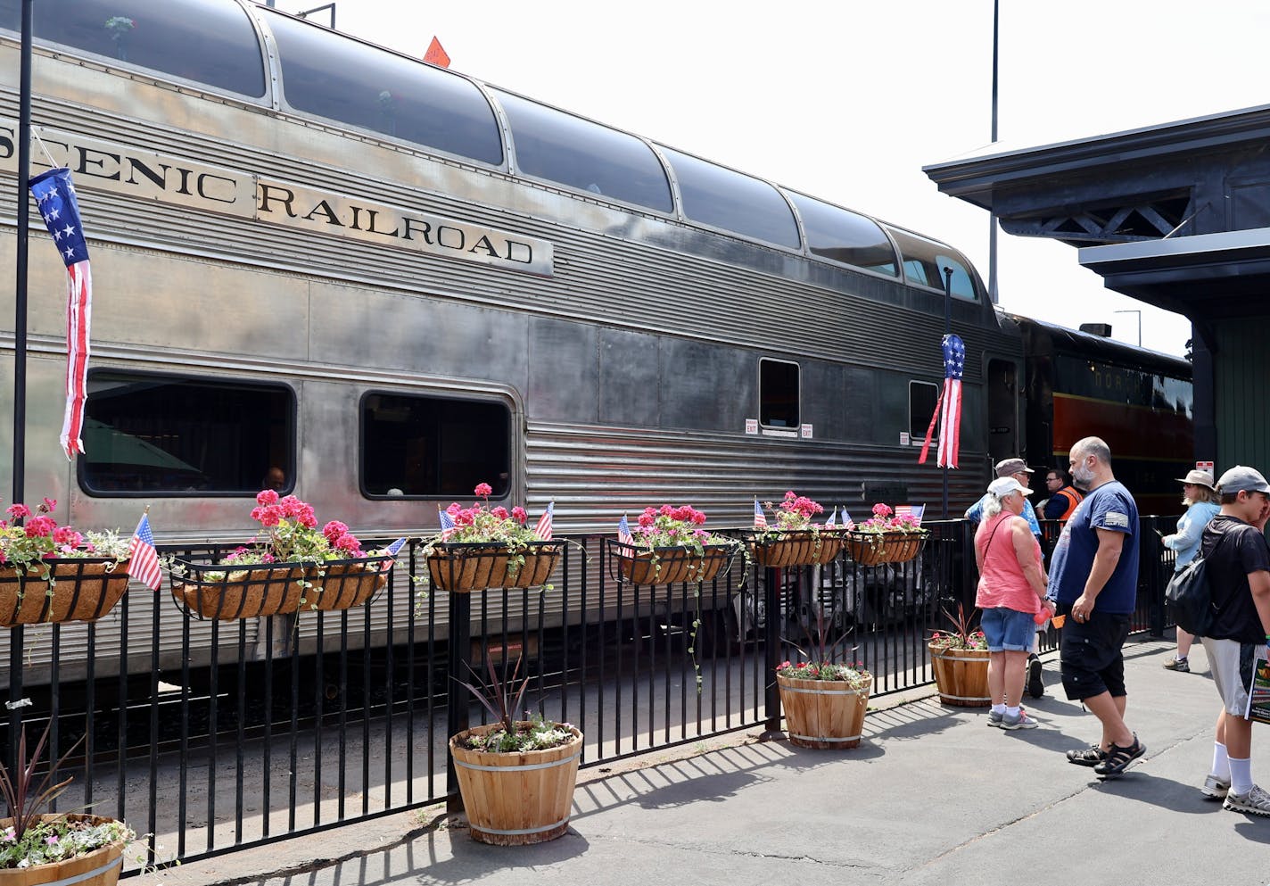 People waited to board a North Shore Scenic Railroad car at the Duluth Depot, which would handle passenger arrivals for the Northern Lights Express, a passenger train service from Minneapolis to Duluth.