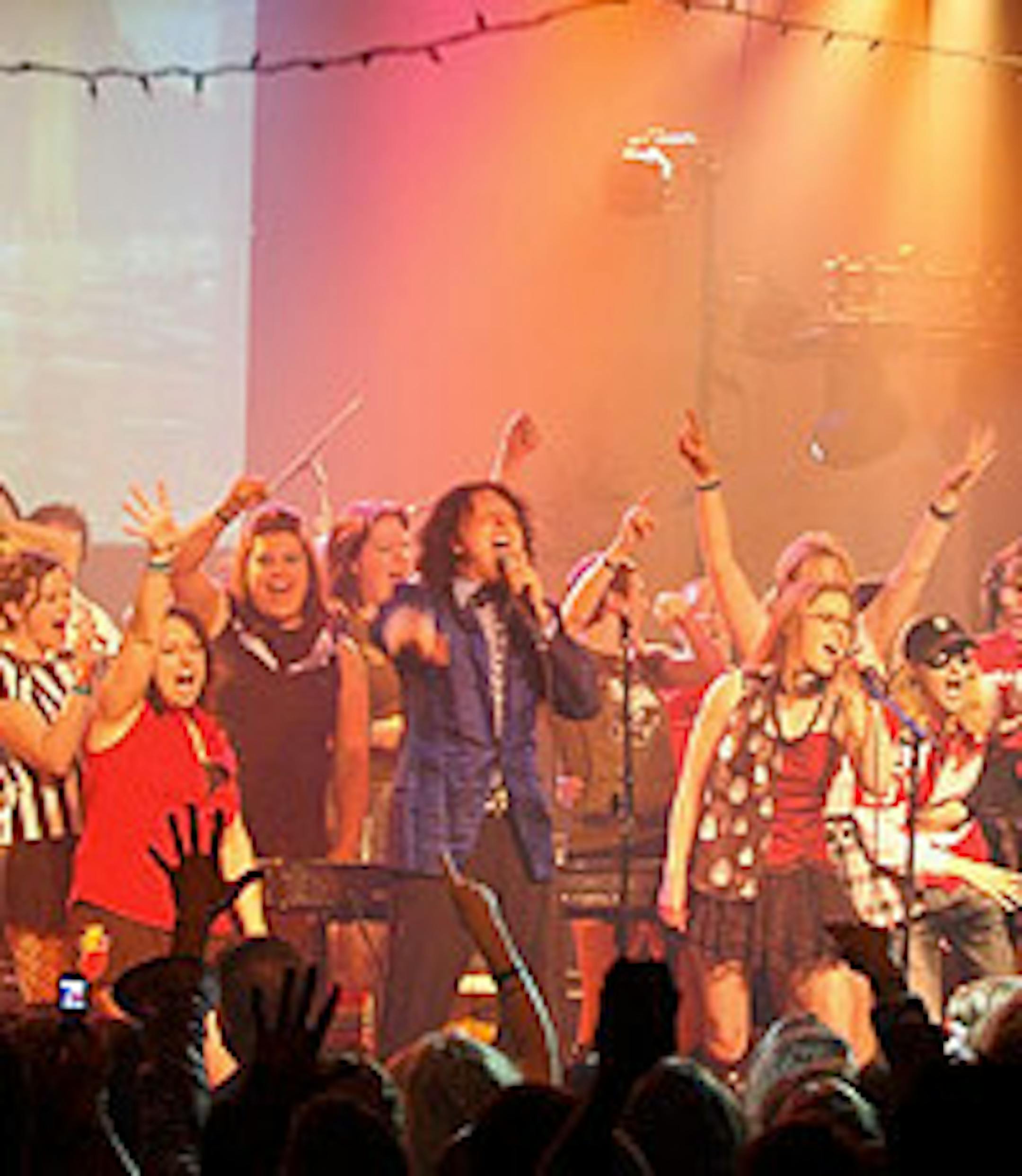 Mark Mallman with the North Star Roller Girls counting down to midnight at Vita.mn's New Year's Eve party at the Varsity Theater