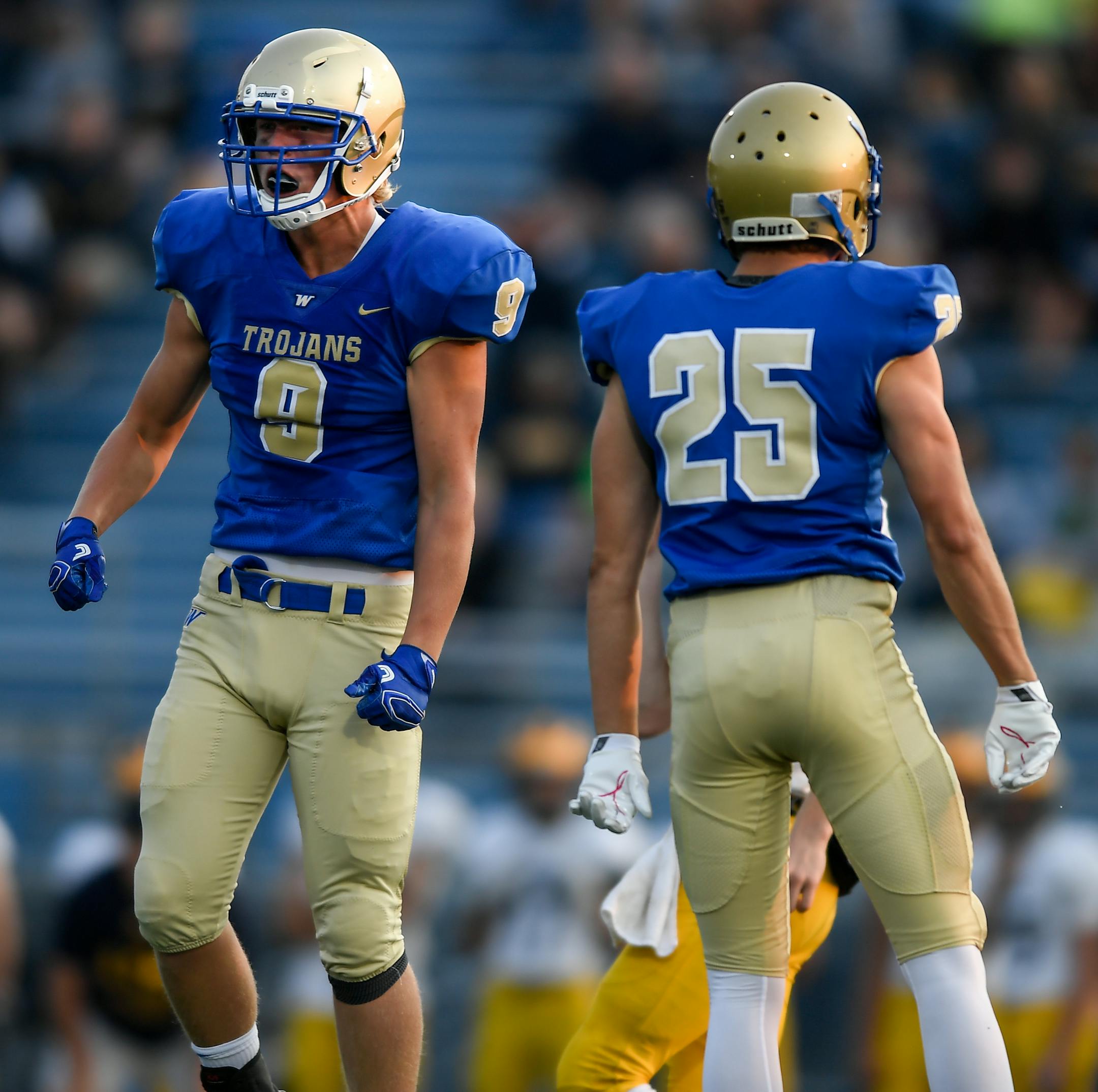 Wayzata linebacker Jake Ogle (9) celebrated after tackling Rosemount running back Garrison Green (27) for a loss of yards in the first quarter Thursday night. ] AARON LAVINSKY ï aaron.lavinsky@startribune.com Wayzata played Rosemount in a high school football game on Thursday, August 31, 2017 at Wayzata High School in Plymouth, Minn.
