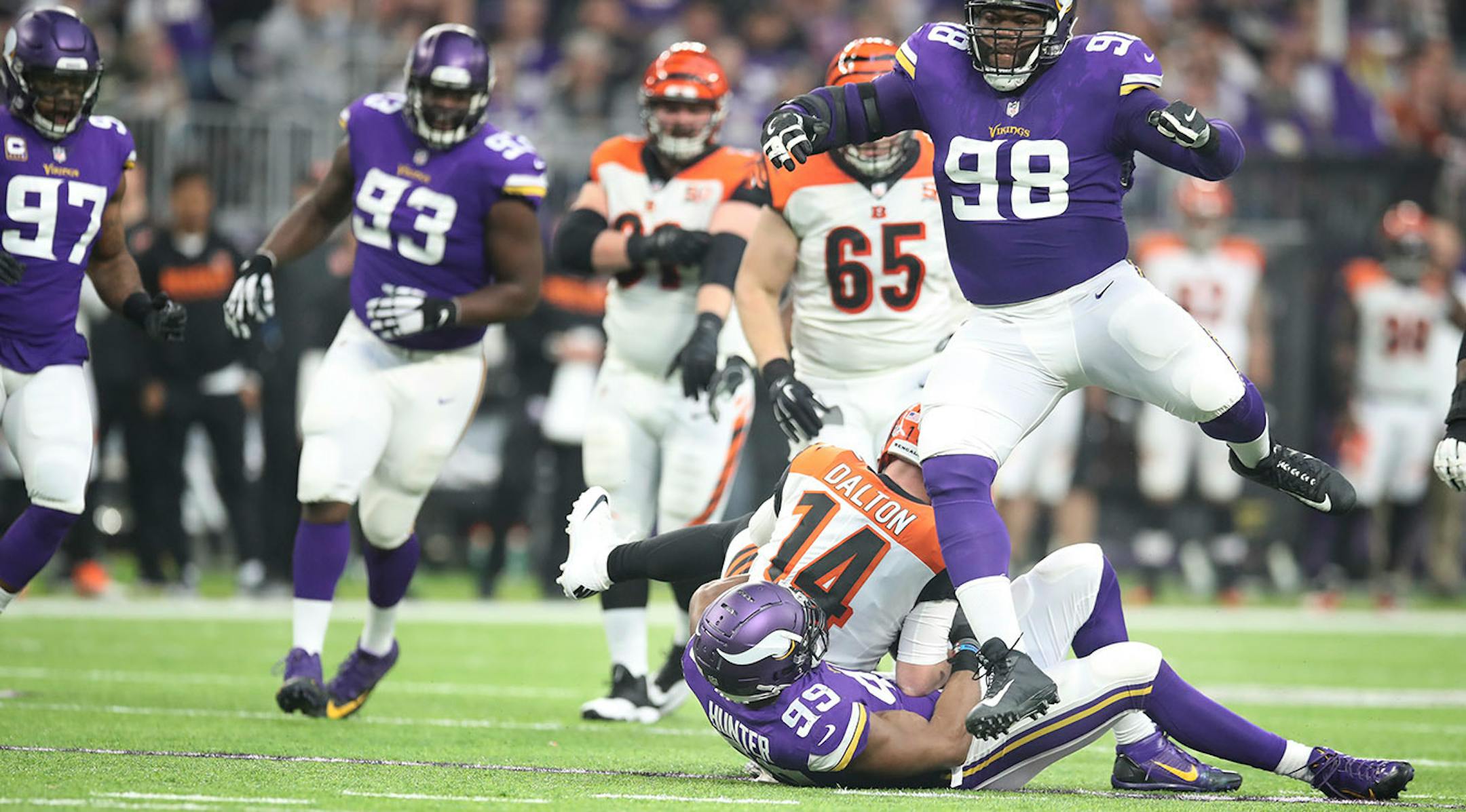 Minnesota Vikings defensive tackle Linval Joseph (98) celebrated as end Danielle Hunter (99) sacked Cincinnati Bengals quarterback Andy Dalton (14) in the second quarter at U.S.Bank Stadium Sunday December 17, 2017 in Minneapolis, MN.