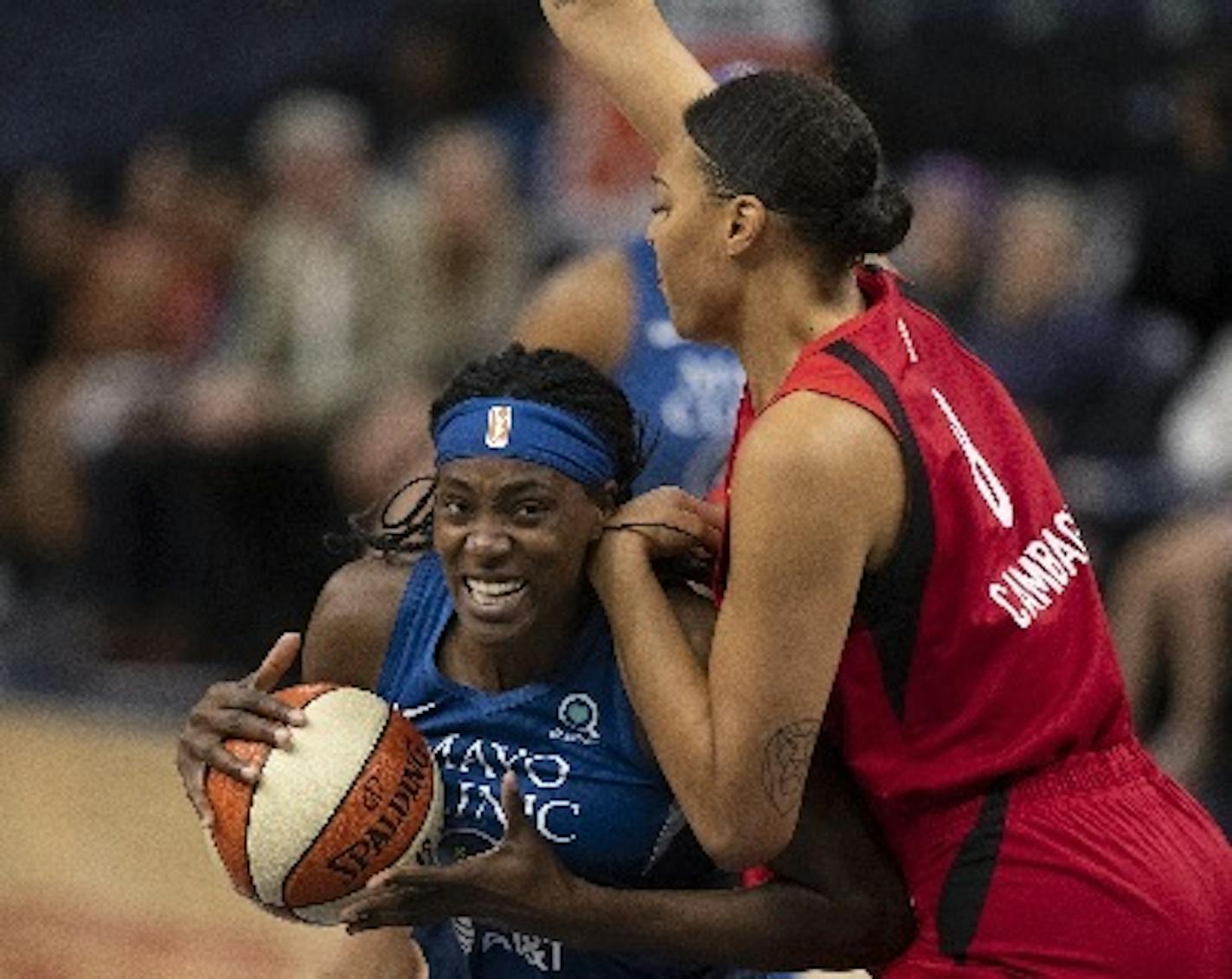 Lynx center Sylvia Fowles looked for room inside against Las Vegas center Liz Cambage in the first quarter Sunday.