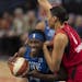 Lynx center Sylvia Fowles looked for room inside against Las Vegas center Liz Cambage in the first quarter Sunday.