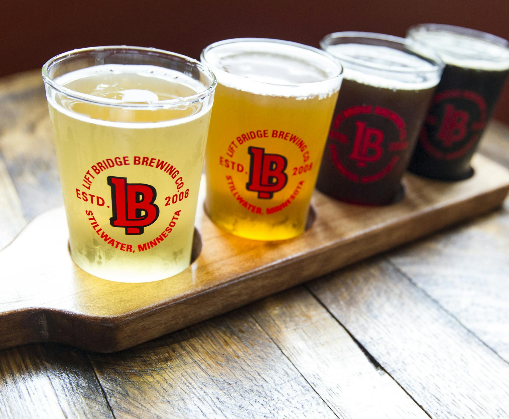 A flight featuring, left to right, Farm Girl, Hop Dish, Chestnut Hill, and Silhouette beers at Lift Bridge Brewery in Stillwater June 27, 2014. (Courtney Perry/Special to the Star Tribune)