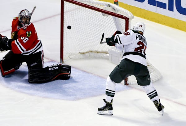 Wild right winger Jason Pominville slipped a rebound past Blackhawks goalie Corey Crawford for the game-winning goal during the third period of the Wi