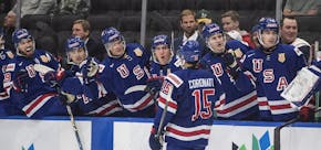 Matthew Coronato (15) celebrated one of his two goals with his U.S. teammates during a 3-2 victory over Sweden in the IIHF World Junior Hockey Champio