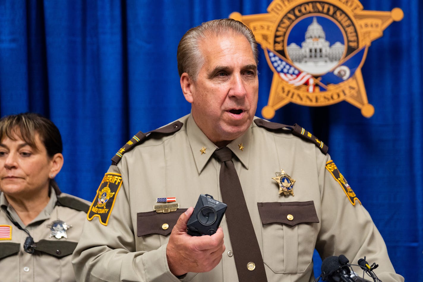 Ramsey County Sherif Bob Fletcher said deputies will be required to activate cameras in situations that may result in police action, but not casual encounters with the public. ] MARK VANCLEAVE ¥ Ramsey County Sherif Bob Fletcher unveiled body cameras that deputies are now wearing on while patrol Friday, Sep. 27, 2019 at the department's Arden Hills patrol station. The Sherif's Department eventually plans to issue cameras to deputies working in all functions.