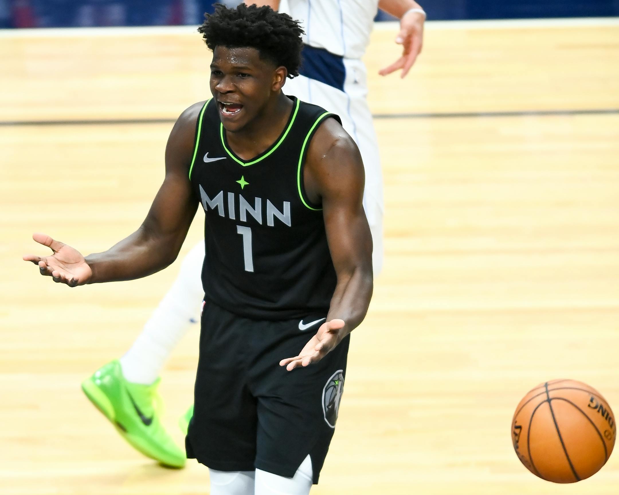 Minnesota Timberwolves forward Anthony Edwards (1) unsuccessfully lobbied for a foul call after scoring a basket in the second half against the Dallas Mavericks.