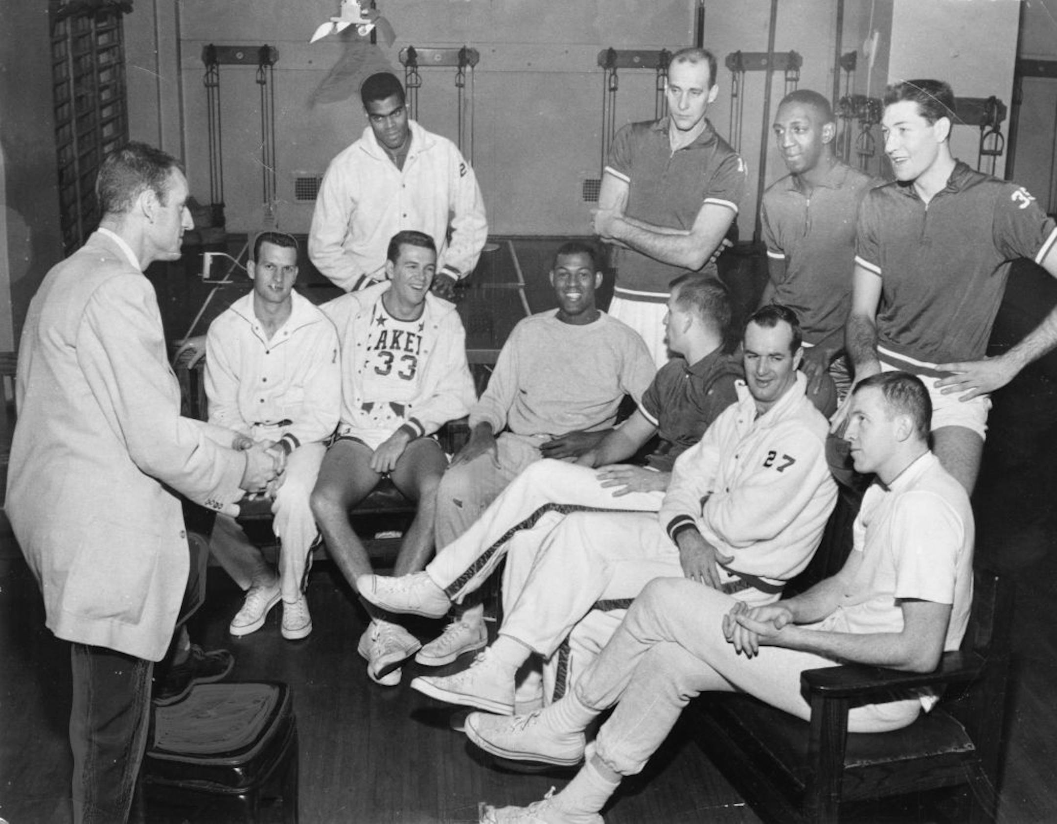Elgin Baylor is in the middle of the row of seated players in this 1960 photo of the team meeting with new coach Jim Pollard. Pictured are, left to right seated, Frank Selvy, Rod Hundley, Baylor, Dick Garmaker, Bob Leonard and Jim Krebs. Standing: Tom Hawkins, Larry Foust, Boo Ellis and Rudy LaRusso. The photo was taken Jan. 4, 1960.