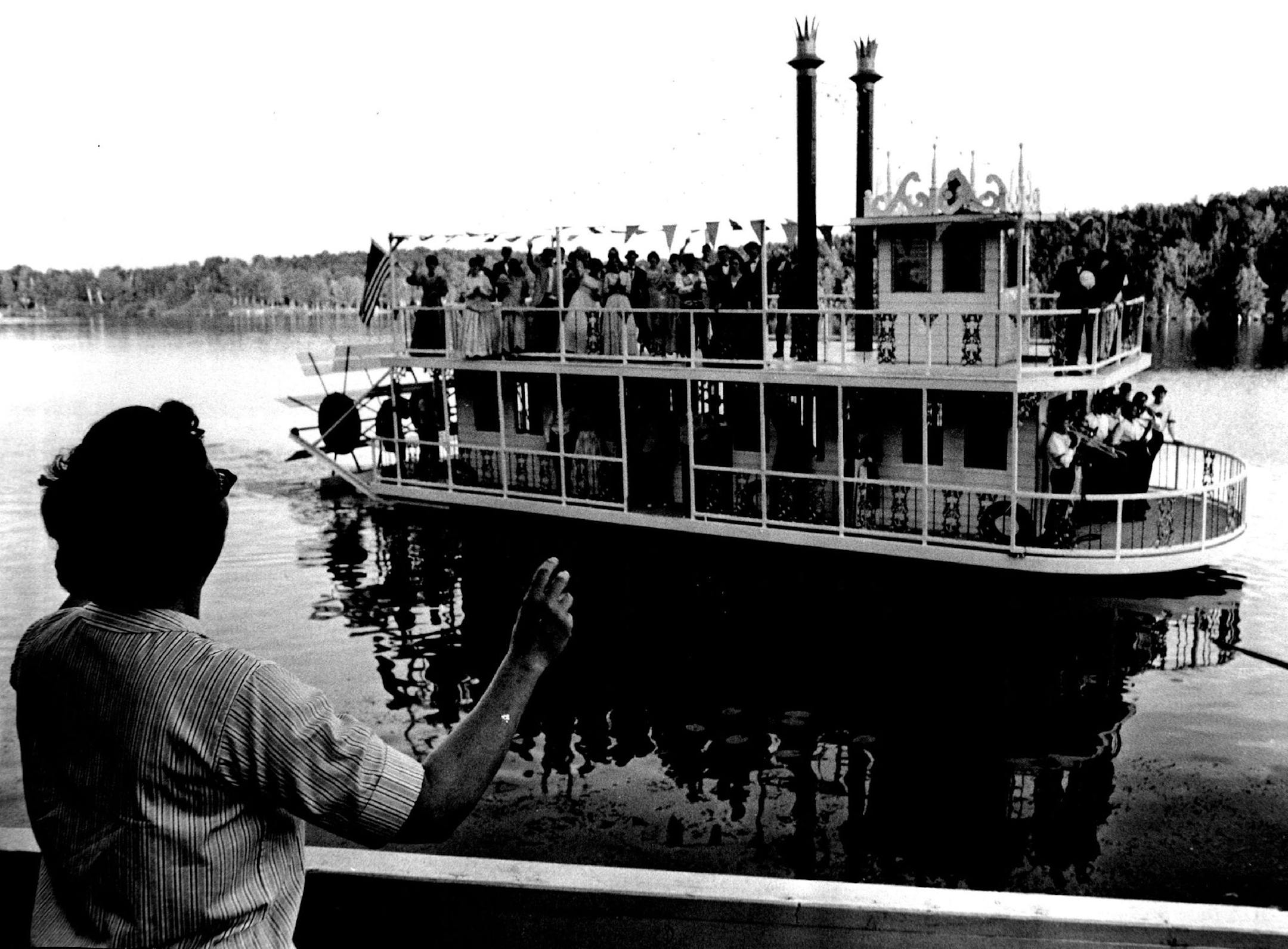 July 3, 1965 During the maiden voyage of the new showboat on the Mississippi River at Grand Rapids, Lois Gildemeister directs from shore while the cast sings on the boat. The craft was made by Boatel Co. of Mora. July 25, 1965 Earl Seubert, Minneapolis Star Tribune ORG XMIT: MIN2015101615172733