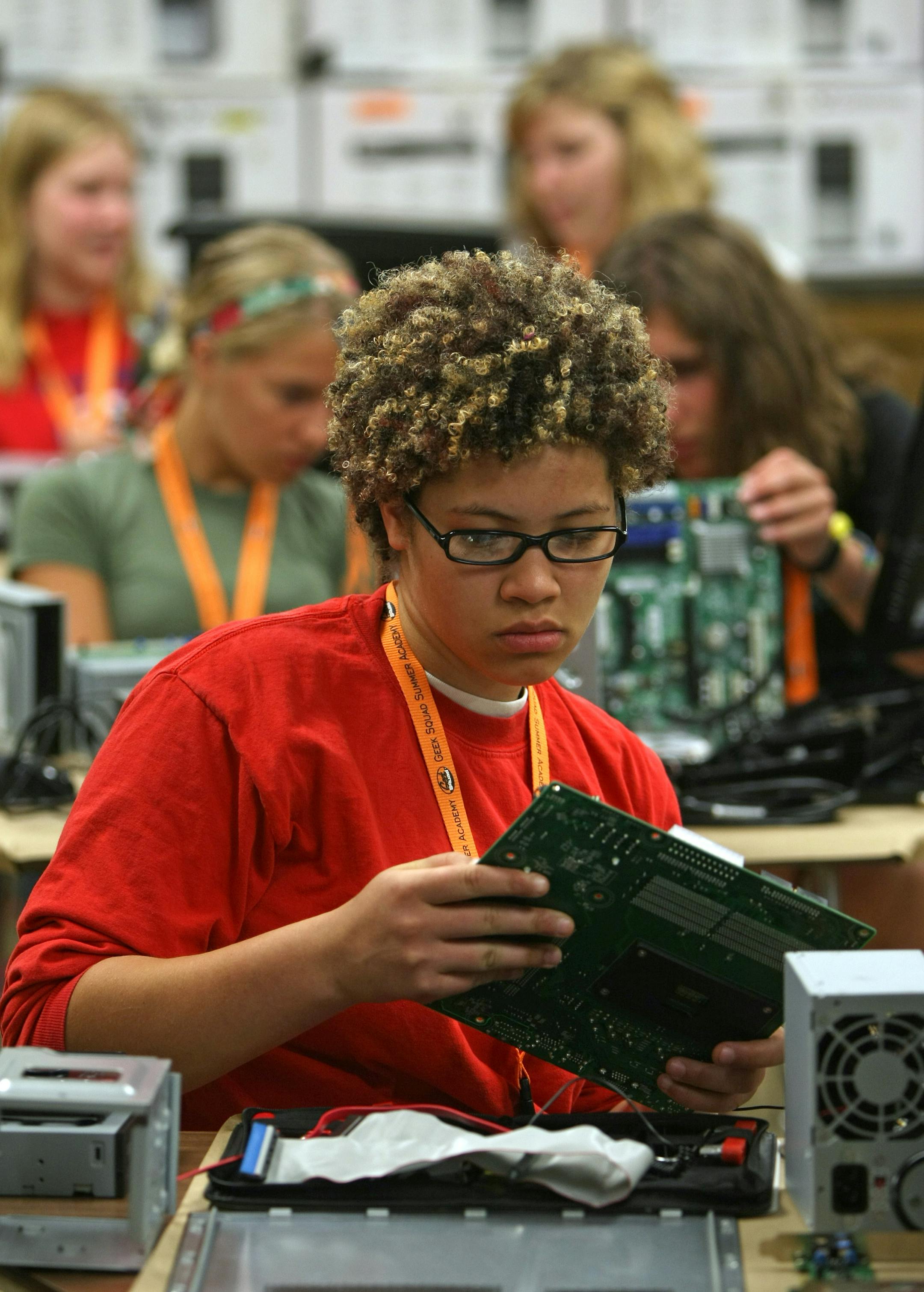 Katana Howard, 14, examined a PC motherboard on Monday at a special computer camp just for girls. The Best Buy Geek Squad Summer Academy for Girls is being held at Mound Westonka High School this week. It ends Wednesday.