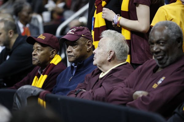 In this Thursday, March 22, 2018 photo, Loyola-Chicago team members from 1963, Jerry Harkness, Les Hunter, John Egan, Rich Rochelle, from left, watch 