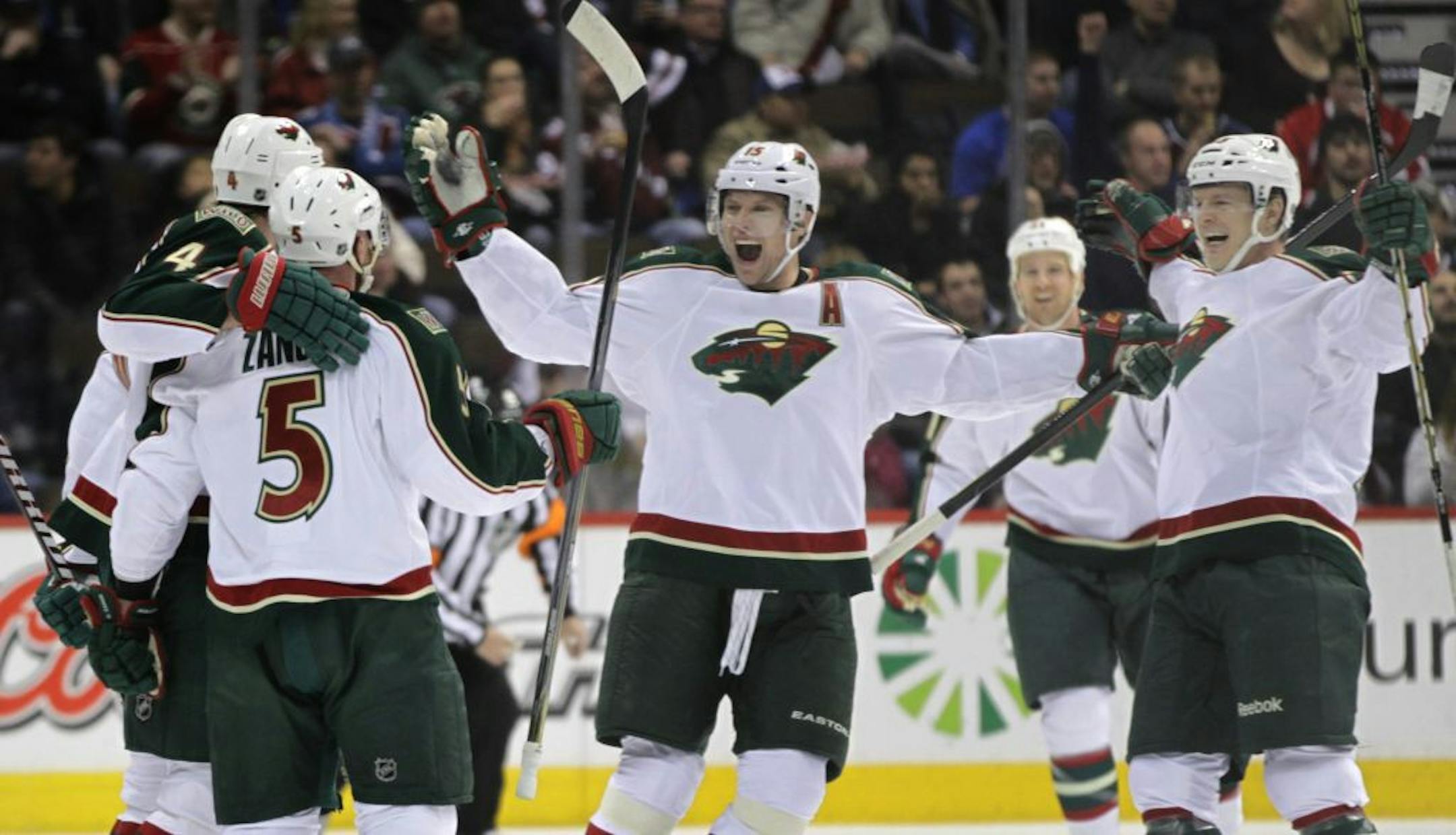 Greg Zanon (5) scored the Wild's only goal, with an assist from Dany Heatley, center. Kyle Brodziak, not pictured, also had an assist.