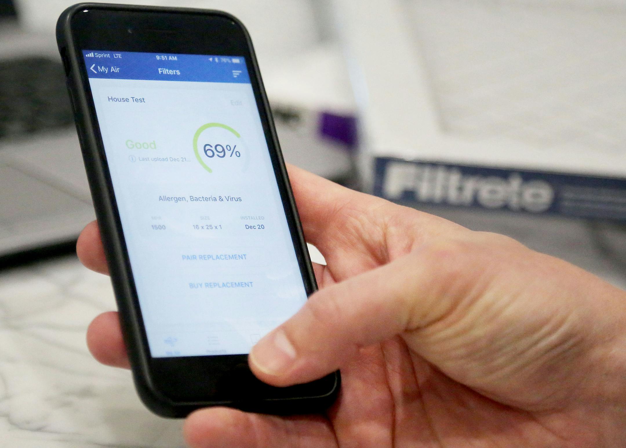 3M's new bluetooth Filtrete Smart Filter and Smart app will be on the market sometime in spring 2018. Here, Patrick Hiner, 3M New Product Marking manager, filtering shows how the air quality at his home can be monitored used a smart phone and app with the new product from 3M Thursday, Jan. 4, 2018, in Maplewood, MN.] DAVID JOLES ï david.joles@startribune.com 3M introduces new "smart" or bluetooth air filter for the home. New technology expected to automate some aspect of air filtration proc