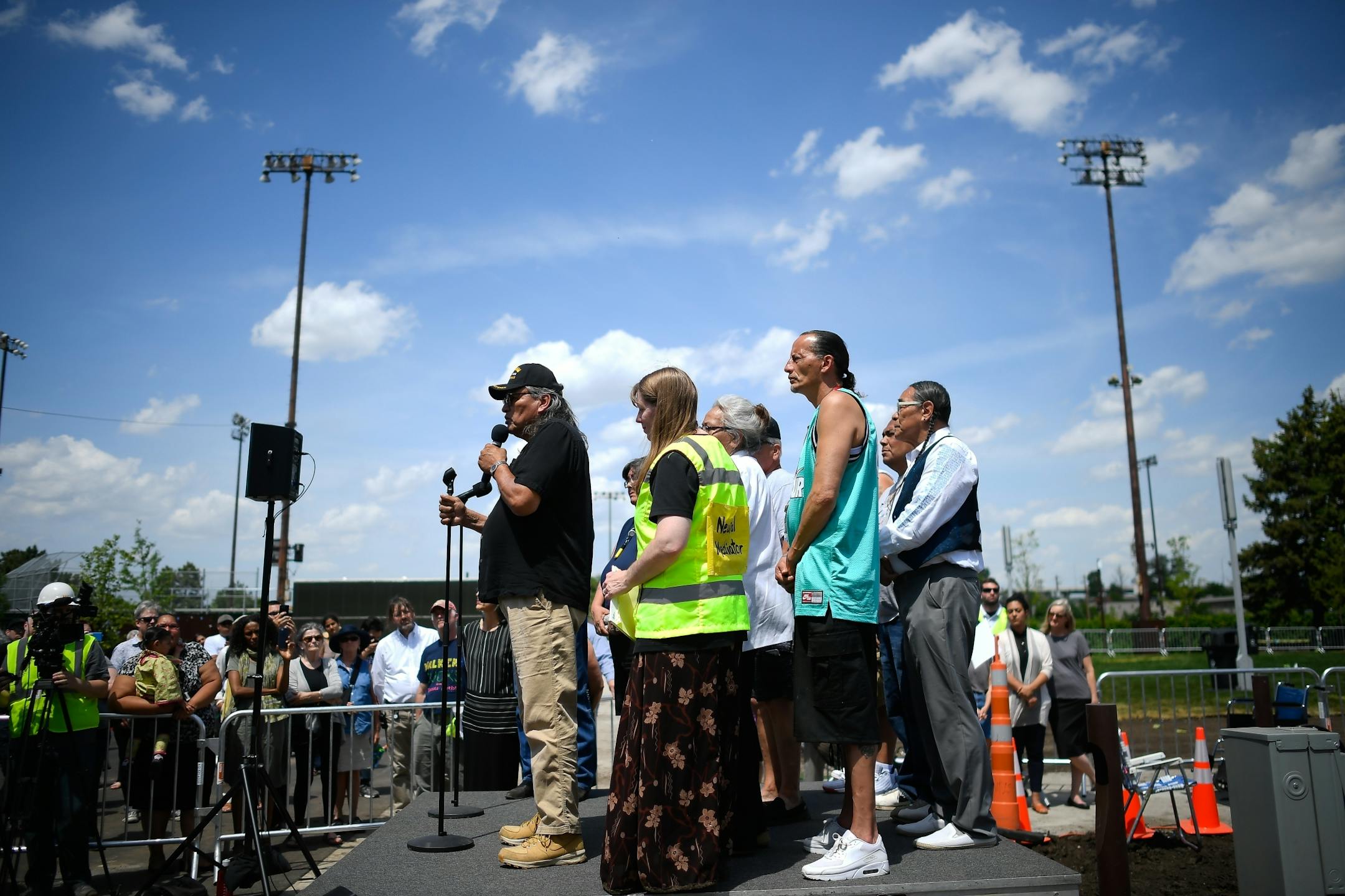 Art Owen, a Dakota from Prairie Island, left of center, was flanked by other tribal representatives and mediator Stephanie Hope Smith during a news conference preceding the dismantling ceremony of the "Scaffold" sculpture Friday.
