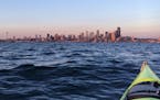 A new view: Kayaking Puget Sound and Elliott Bay offers a different perspective on the Seattle skyline.