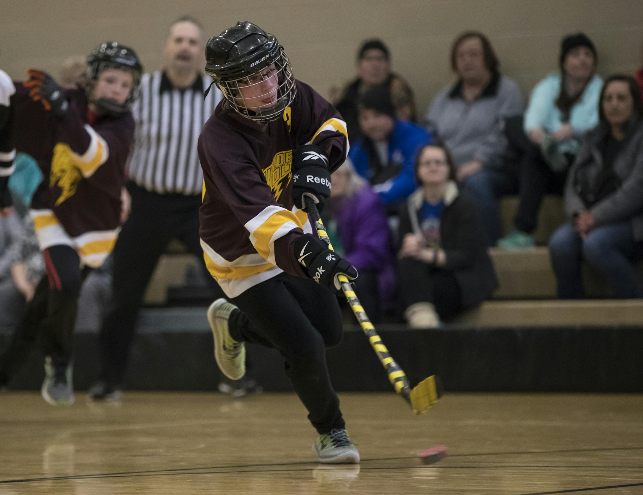 Tyler Tunucci (3) shot the puck to score one of at least three points he scored during the semi-final adaptive hockey game between the South Washington Thunderbolts and North/Tartan on Wednesday, March 8, 2017, at East Ridge High School in Woodbury, Minn. ] RENEE JONES SCHNEIDER &#x2022; renee.jones@startribune.com