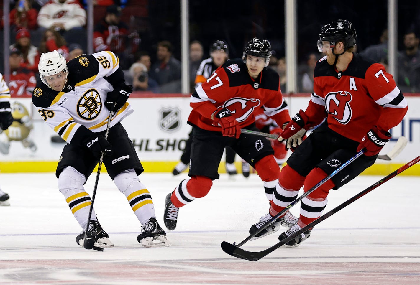 FILE - Boston Bruins' Vinni Lettieri (95) shoots against the New Jersey Devils during the second period of an NHL preseason hockey game Oct. 3, 2022, in Newark, N.J. The Minnesota Wild signed Lettieri to a two-year, two-way contract. The deal brings the grandson of hockey great Lou Nanne back to his home state. The 28-year-old Lettieri will make $750,000 in the NHL and $550,000 in the AHL. He spent most of last season with Boston's minor-league affiliate. He had 23 goals and 26 assists in 48 games for Providence. (AP Photo/Adam Hunger, File)