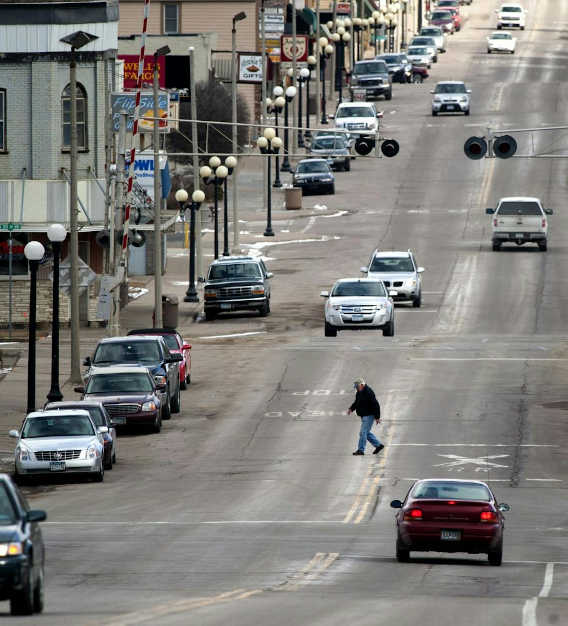 When Richard Lucas crossed West Main St after finishing lunch at the Chameleon Coffee Shop in New Prague, as he's done since 1974, he crossed from Democrat Tim Walz congressional district into Republican John Kline's. The town is now split in half due to redistricting. Friday, February 24, 2012