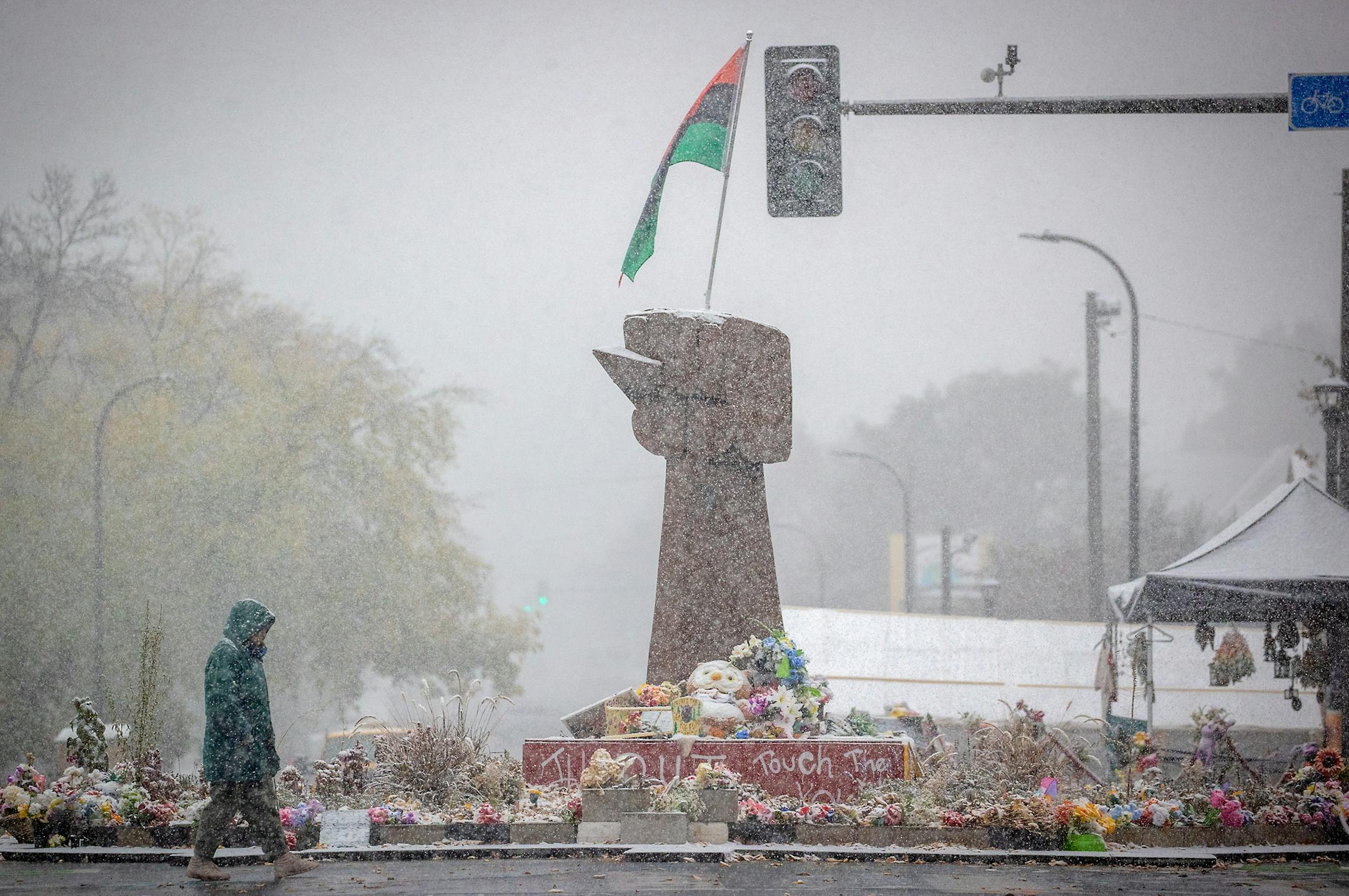 Snow fell over the George Floyd memorial in Minneapolis. ] ELIZABETH FLORES • liz.flores@startribune.com