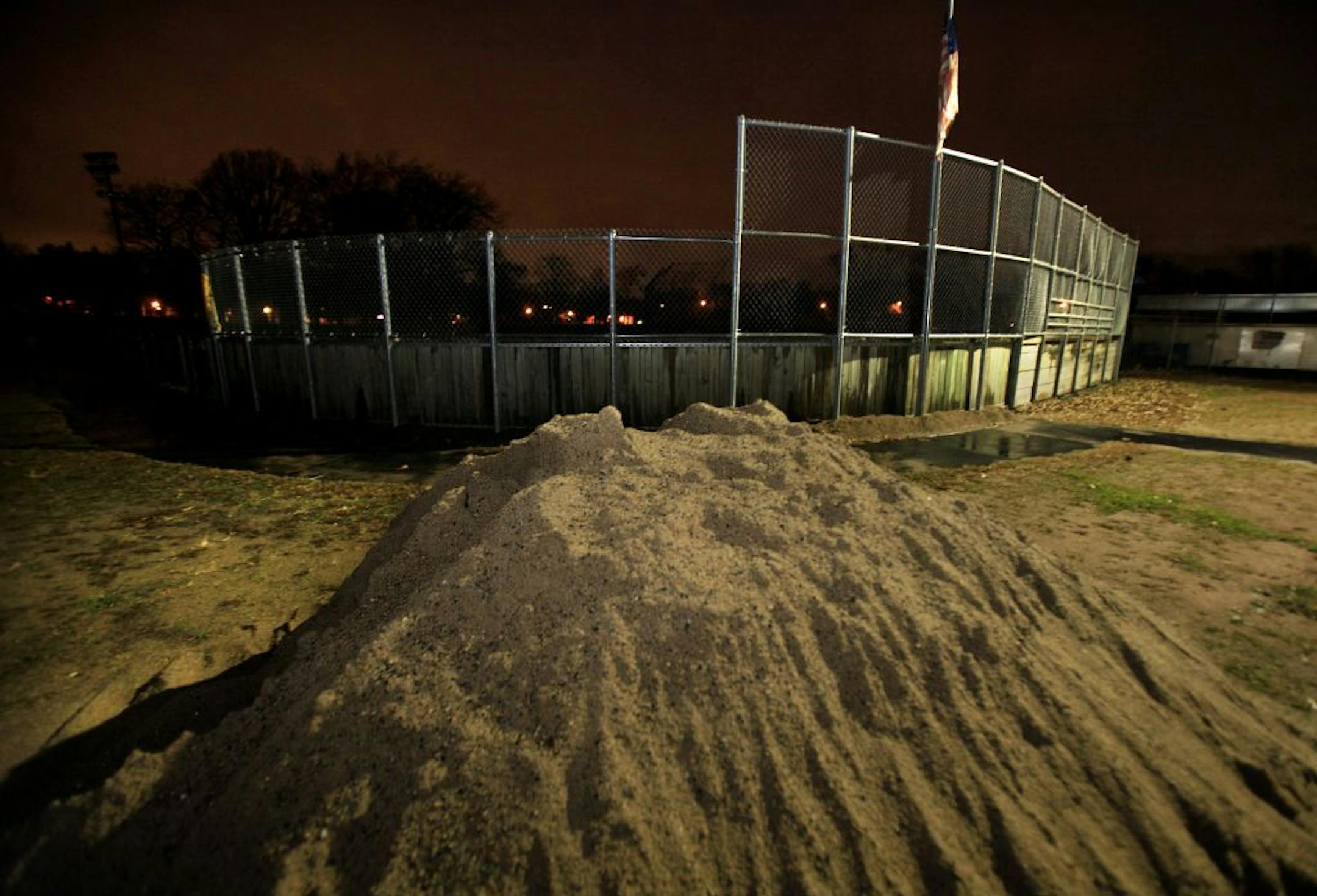 A pile of sand was left after thieves stole the copper at the Lake Phalen outdoor ice rink in St Paul. The Phalen Rec Center is located at 1000 East Wheelock Parkway in St. Paul, MN on Novenmber 6, 2012.