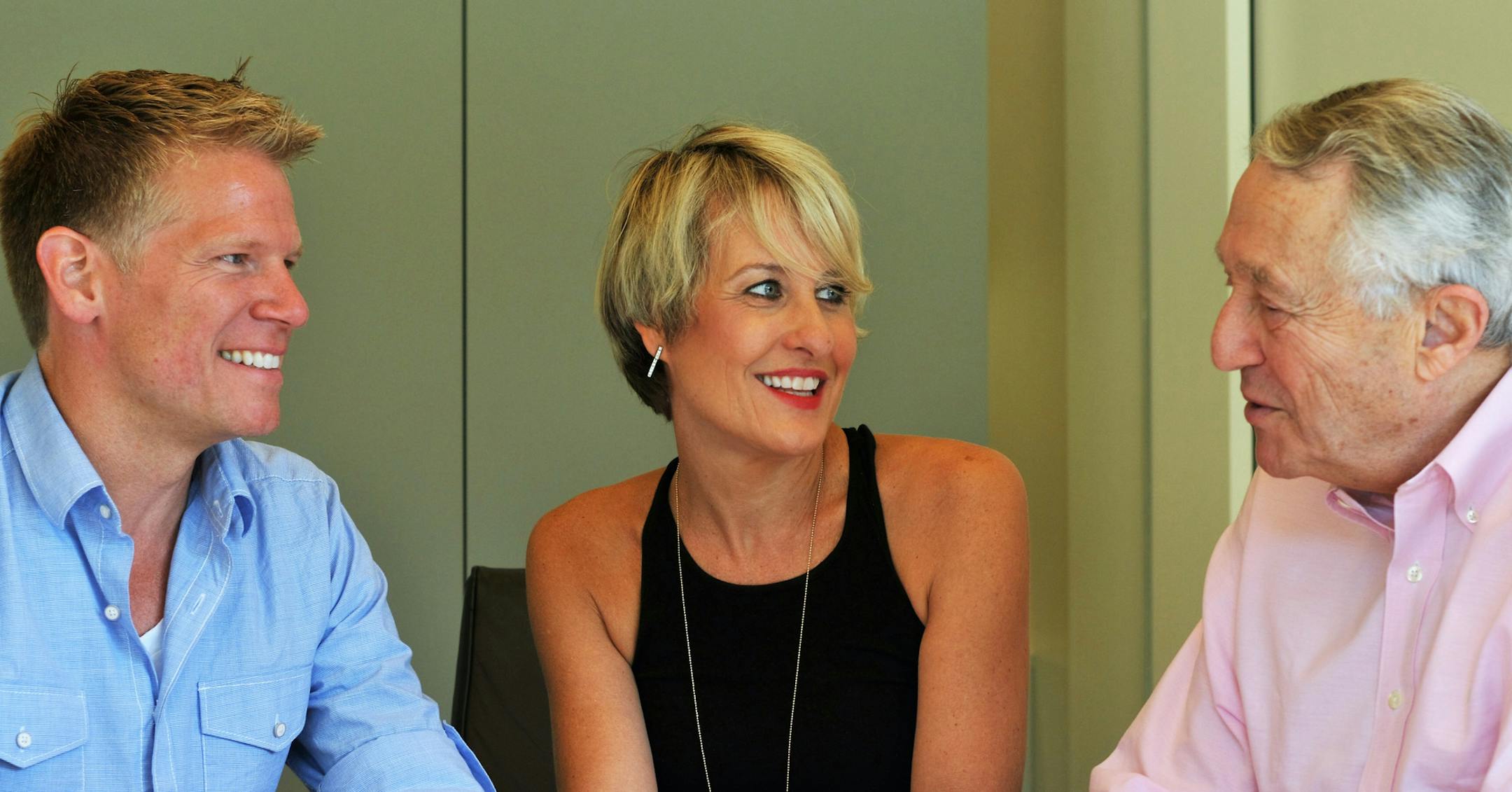 Mike and Megan Tamte, founders of Edina-based Evereve meet with investor Gordon Segal (right), co-founder of Crate & Barrel. credit: Evereve