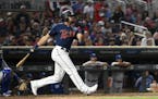 Minnesota Twins center fielder LaMonte Wade Jr. (30) hit a triple in the bottom of the fifth inning Saturday against the Kansas City Royals. ] Aaron L