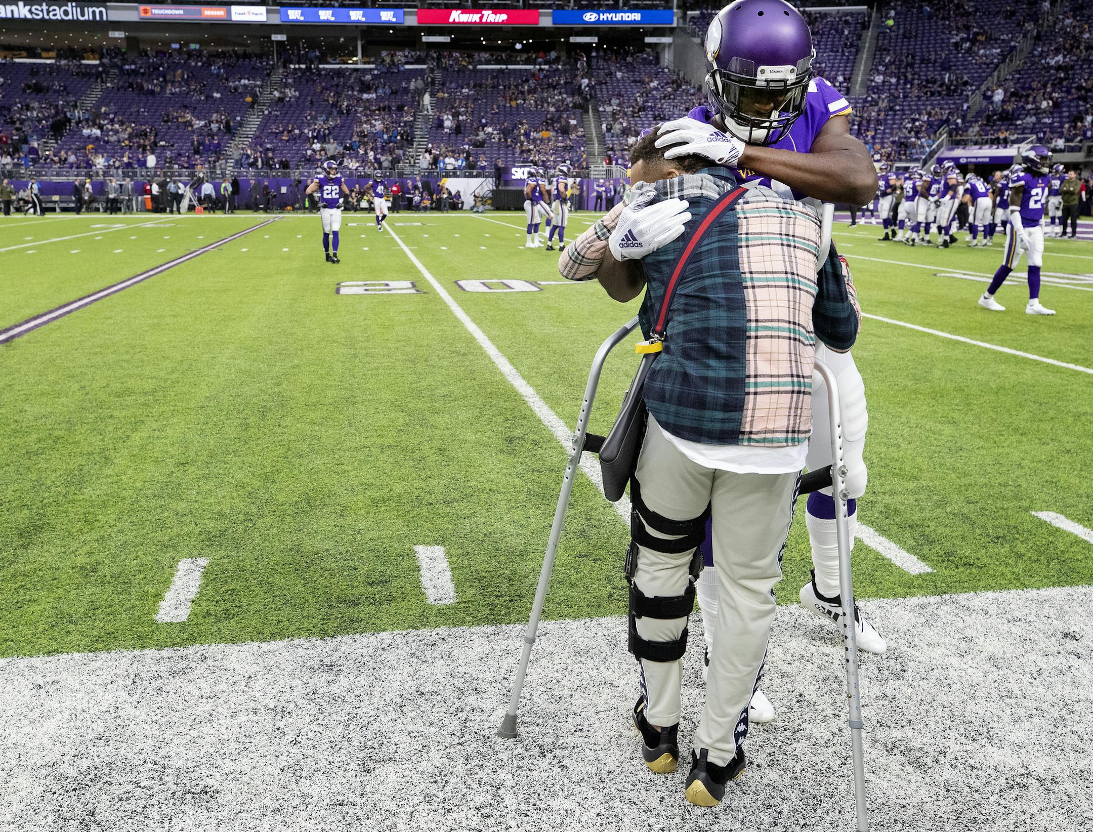 Injured Vikings cornerback Mike Hughes got a hug from Xavier Rhodes during pregame warmups. ] CARLOS GONZALEZ ï cgonzalez@startribune.com ñ Minneapolis, MN ñ November 4, 2018, US Bank Stadium, NFL, Minnesota Vikings vs. Detroit Lions