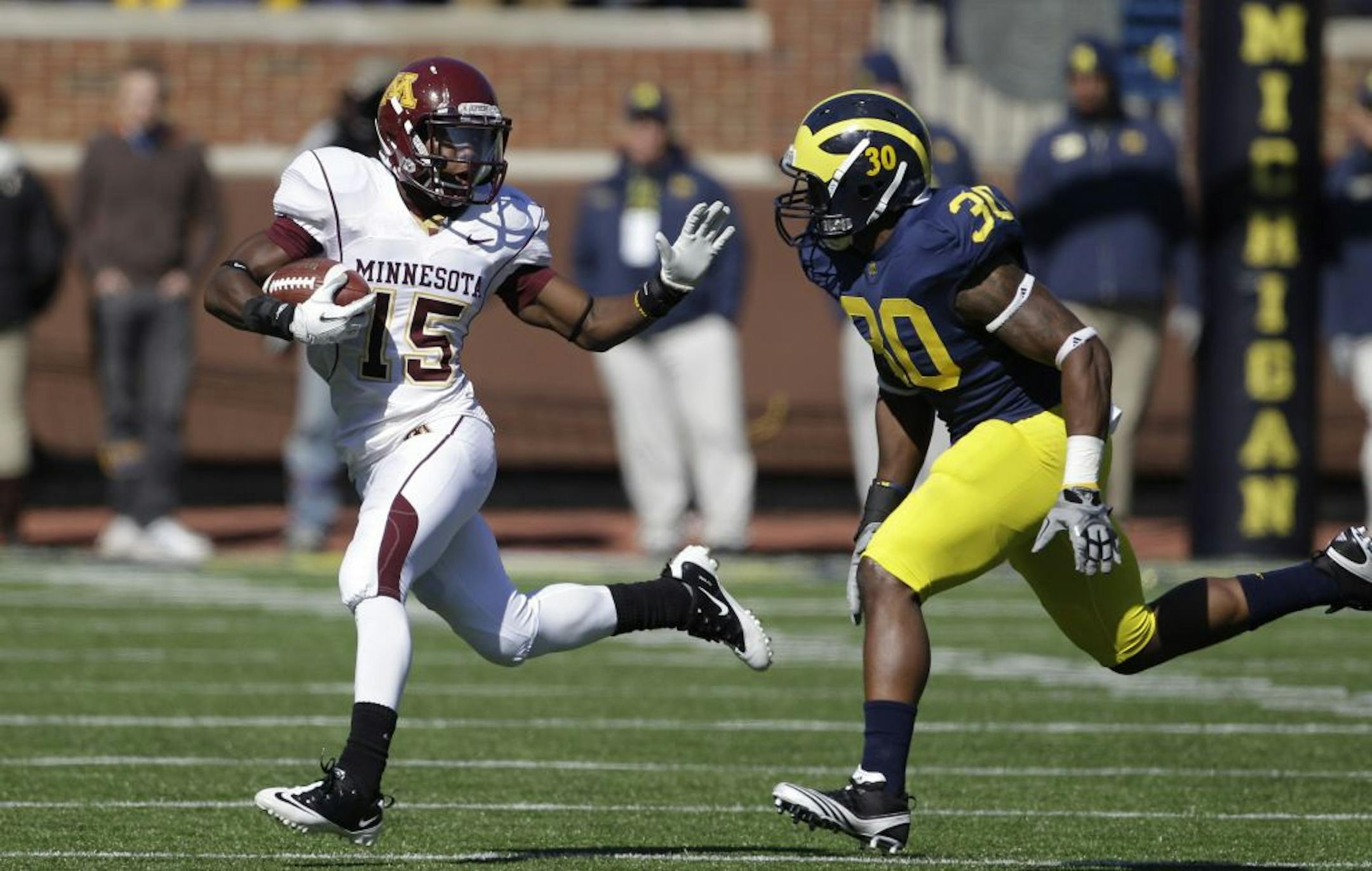 Gophers freshman Marcus Jones catches a pass against Michigan last season.