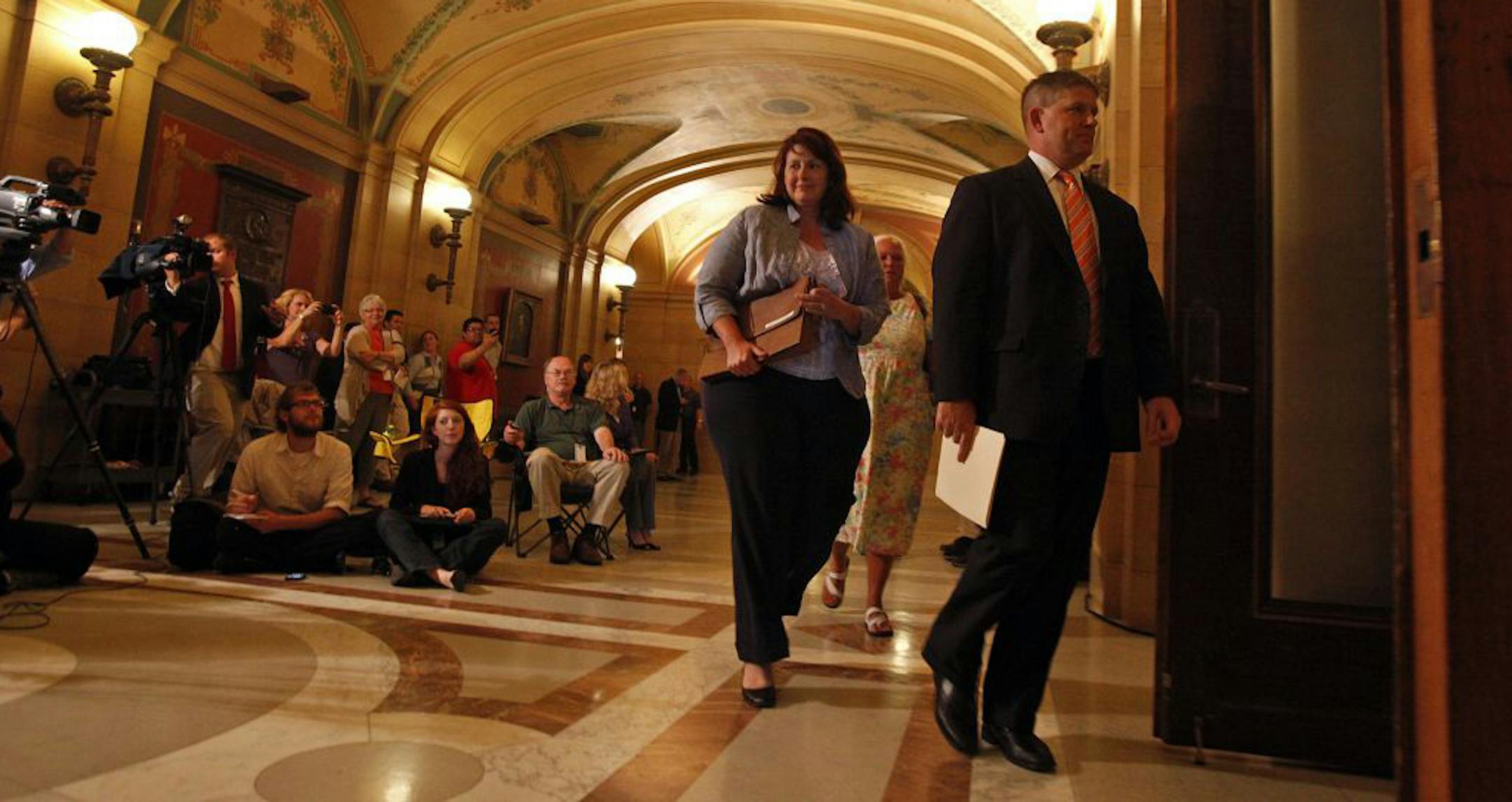 Minnesota GOP leaders Rep. Kurt Zellers, right to left, Rep. Mary Liz Holberg and Sen. Amy Koch headed into Gov. Mark Dayton's office to discuss the latest budget proposal at the Capitol, Thursday.