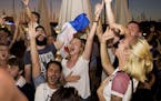 Fans celebrate by dancing and chanting following France's 1-0 victory in the World Cup semifinal against Belgium, in Marseille, July 10, 2018. For cou